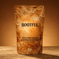 ROOTFUL Apple Cider Vinegar & Kombucha Gummies pouch – 60 gummies / 30 servings, warm amber studio shot on wooden surface